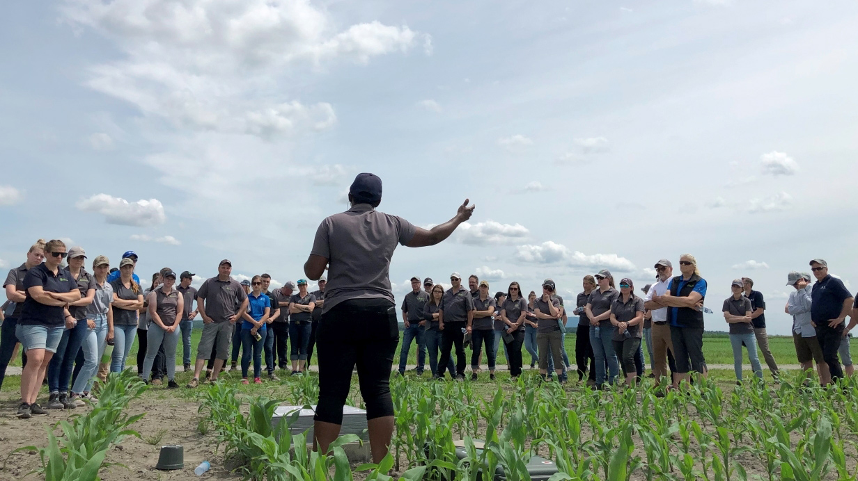Lucie Kablan explains the use of the intelligent soil analysis probe to agri-advisors at the crop production research farm.