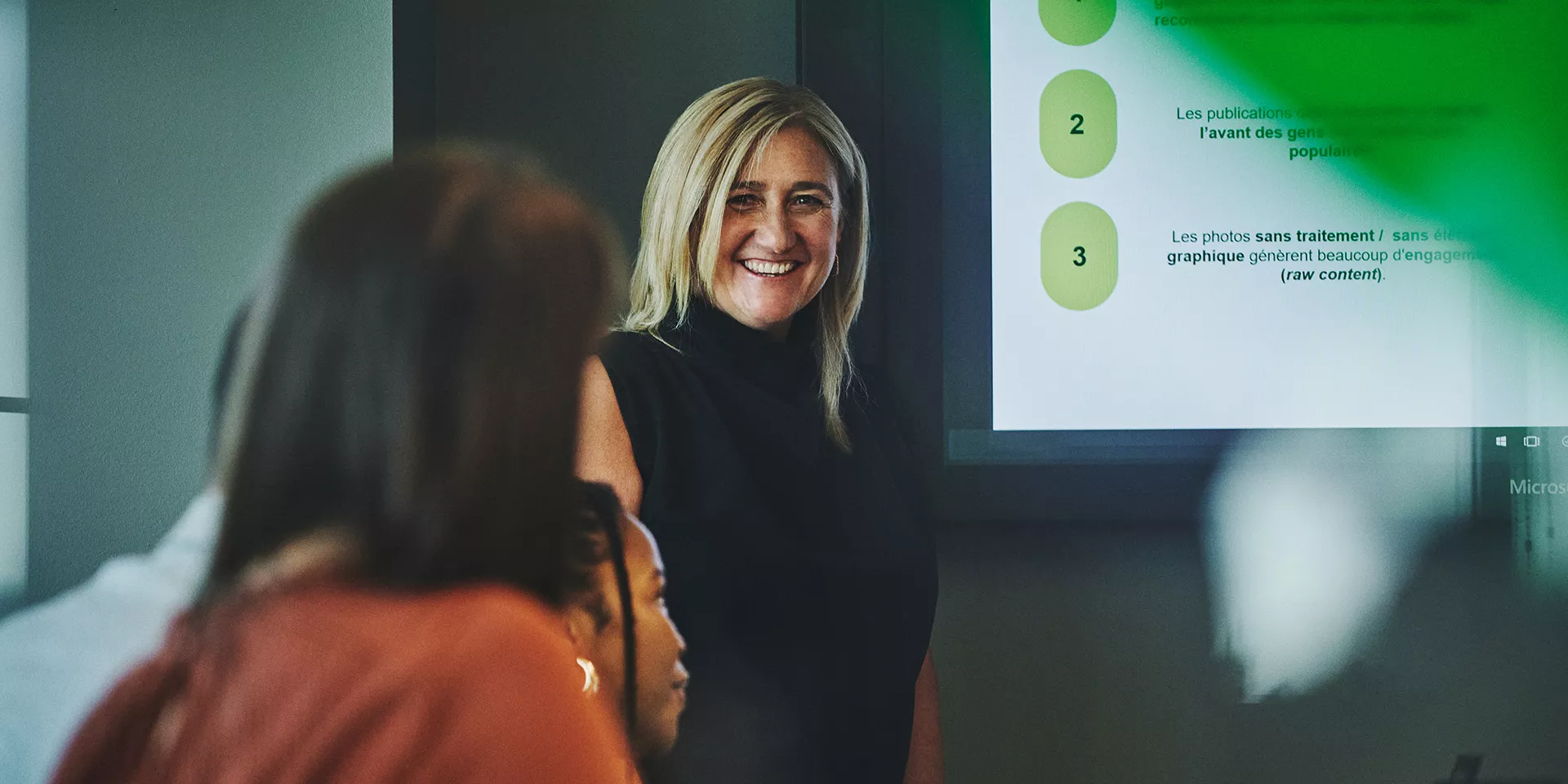 Des employés dans une conférence.